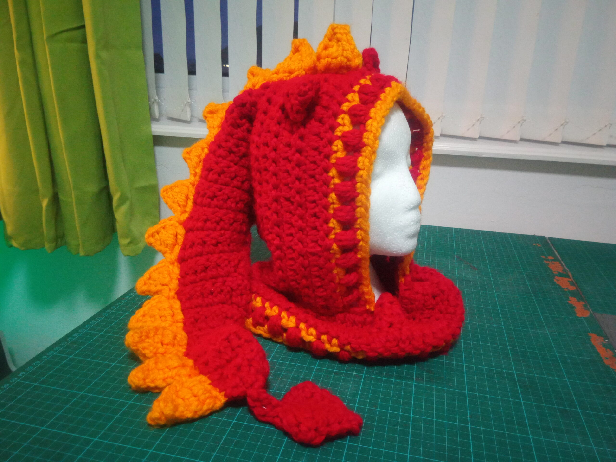 Red and yellow dragon hood