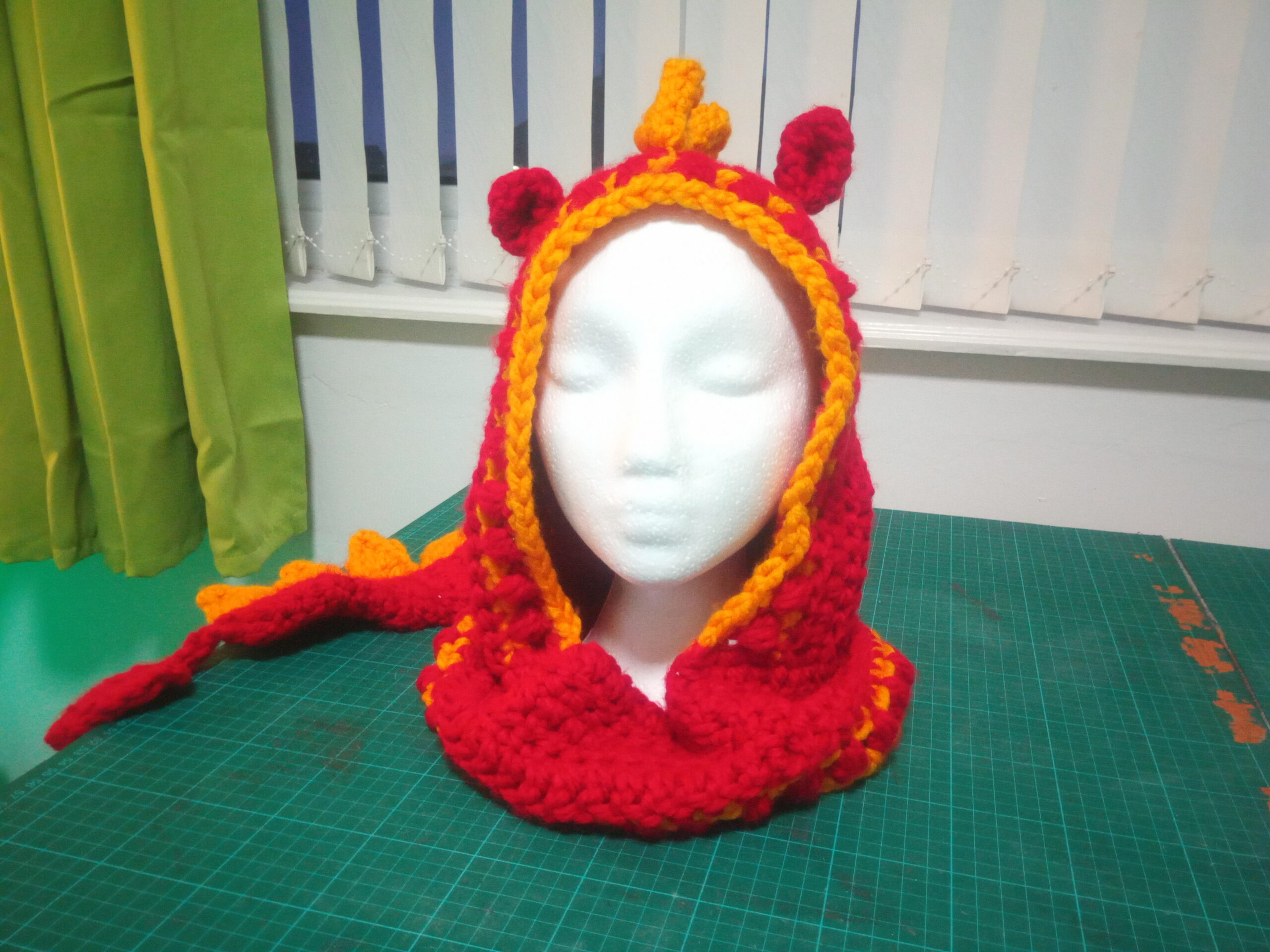 Red and yellow dragon hood